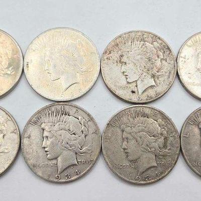 #1690 • (8) 1925-1934 Morgan Silver Dollars
