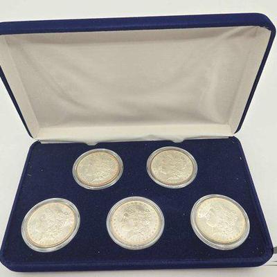 #1508 • (5) 1881-1885 Morgan Silver Dollars
