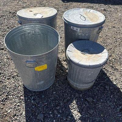 #83010 • (4) Galvanized Steel Trash Cans with Lids
