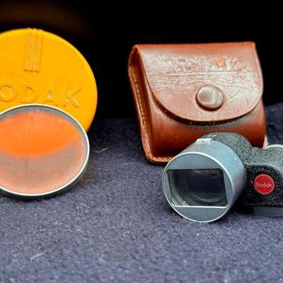 (2) Kodak Accessories
Both items come with origional carrying cases. Kodachrome type A daylight filter - series VI. Attachable view piece...