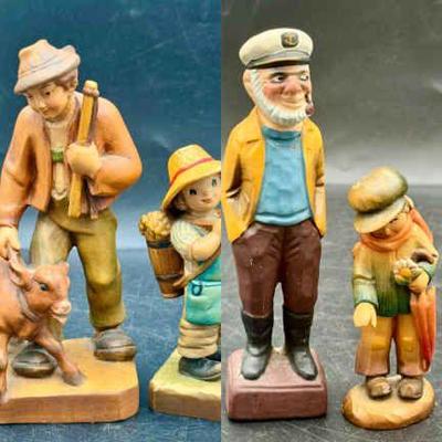 (4) Figurines Feat. Anri
A couple of tiny chips as shown 
ANRI Club Wood Carving #2 Boy w/ Umbrella #665-002 4" Italy 
Sailor...