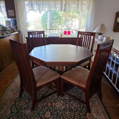 Mid century modern dining table and contemporary dining chairs