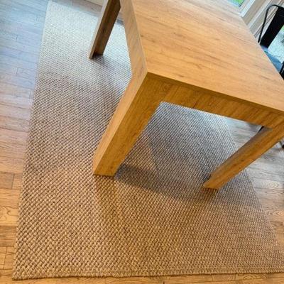 Large Woven Natural Fiber Rug – Likely Jute or Sisal	