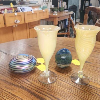 Handblown Glass. Rick Strini Goblets. Gary Levay Round Paperweight, John Lewis Studios Moonscape Paperweight.