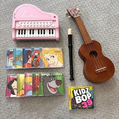 Lot #129 - Musical Toy Lot including Little Musician Keyboard and Mahalo Ukulele