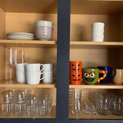 Lot #18 - Assorted Glassware and Mugs Lot - Includes Halloween Mugs, Ramekins, and Drinking Glasses.
