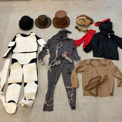 Lot #146 - Kids Costume Lot - Including Star Wars Stormtrooper, Indiana Jones, Vintage Style Hats, and More.