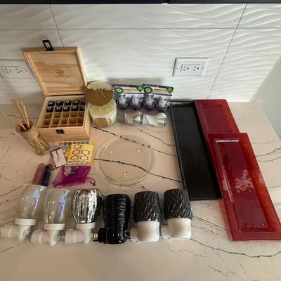 Lot #37 - Home Decor and Scent Lot - Scentsy Diffuser, Rahda Essential Oils, Candles, Decorative Trays, and More.