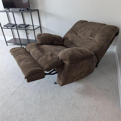 Lot #114 - Brown Upholstered Rocking Manual Recliner Armchair