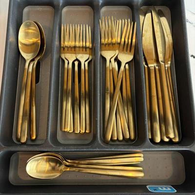 Lot #24 - Gold Stainless Cutlery Set - Spoons, Forks, and Knives.