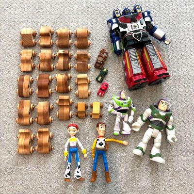 Lot #127 - Toy Lot - Astrobot Robot, Toy Story Action Figures & Wooden Vehicles