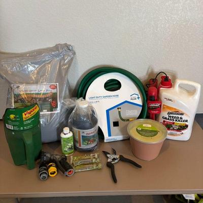 Lot #176 - Gardening Supplies Lot - Home Plus Garden Hose, Spectracide Weed Killer, Vigoro Spot Shaker, RM43 & More.