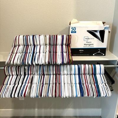 Lot #66 - Large Lot of Plastic Hangers with Two Wood Clip Hangers