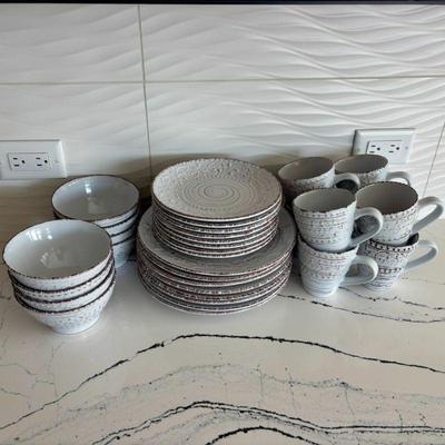 Lot #16 - Elama Decorative Dinnerware Set for 8 - Plates, Bowls, and Mugs.