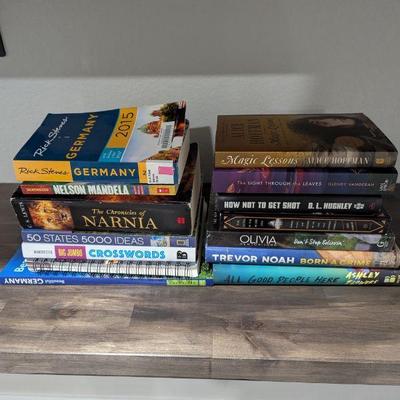 Lot #172 - Miscellaneous Books: Travel, Puzzles, Novels Assorted Book Lot - Travel Guides, Fiction, and Non-Fiction Titles