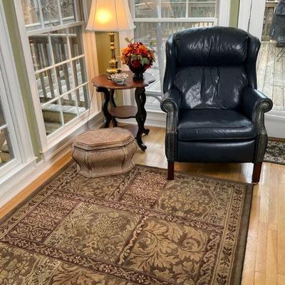 Cozy living room set recliner rug lamp table and decor