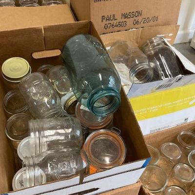 Large assortment of glass jars