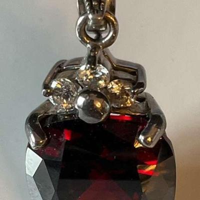 Sterling silver and red gemstone pendant