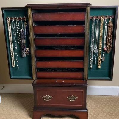 Bombay co jewelry cabinet filled with costume jewelry