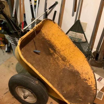 Heavy duty two wheel wheelbarrow pull behind a tractor