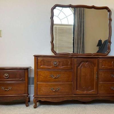 Bassett brand nine drawer dresser with mirror one nightstand