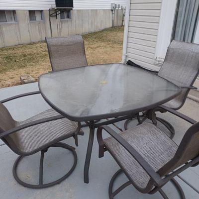 Glass table and 4 chairs