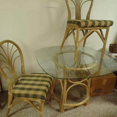 Glass table and two chairs
