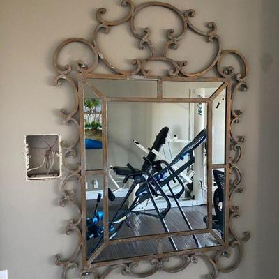 Scrolled wrought-iron mirror
36 x 51 tall

