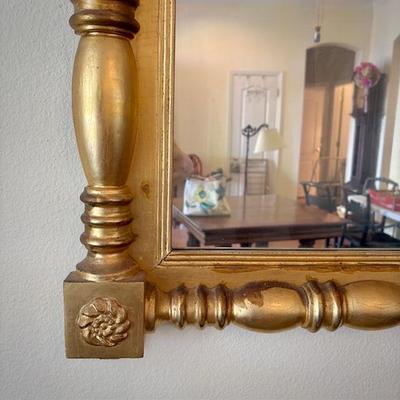 Antique gilt split spindle mirror with seashell detail