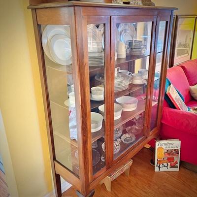 Antique china cabinet with glass front and sides, filled with Block Spal "Grey Dawn" china