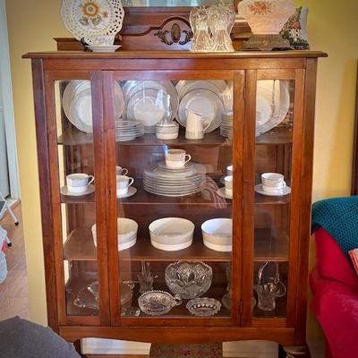 Antique china cabinet with glass front and sides, filled with Block Spal "Grey Dawn" china