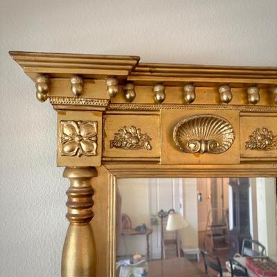 Antique gilt split spindle mirror with seashell detail