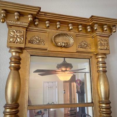 Antique gilt split spindle mirror with seashell detail
