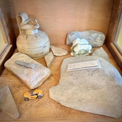 Vintage narrow display case, holding rock collection