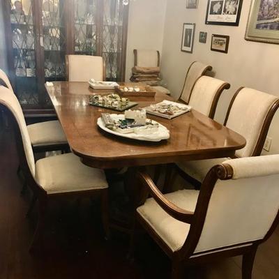set of 10 dining chairs and slip covers $450
dining table $399
44 X 76"