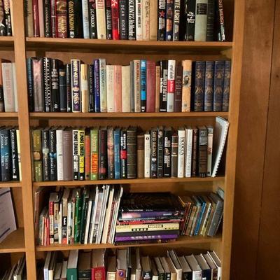 Bookcase full of fiction and non fiction hardbacks