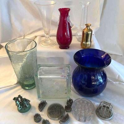 Glass vases and flower frogs