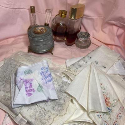 Vintage perfume bottles and hankies