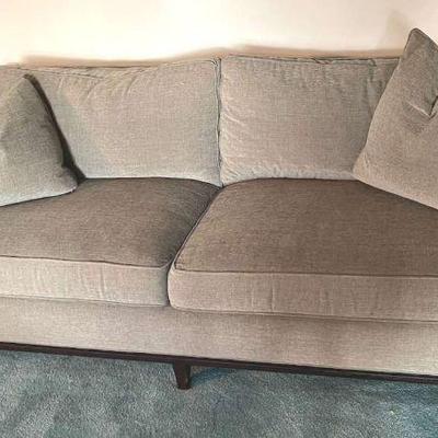 Modern cozy couch in gray velvet