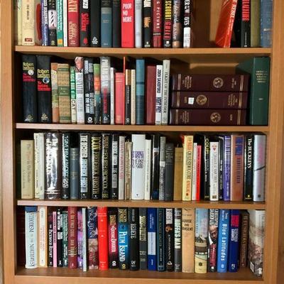 Bookcase full of fiction and non fiction hardbacks 3
