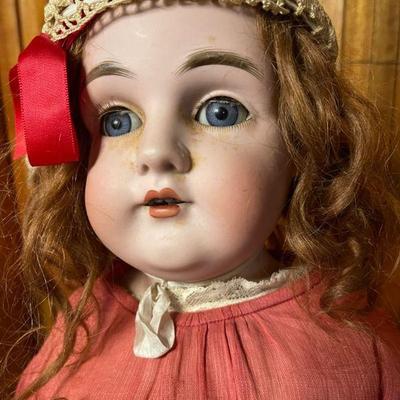 Unsigned bisque head doll