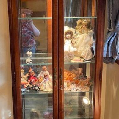 Howard miller glass front cabinet with lighting