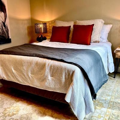 Bed, rug, linens, lamps and side tables 