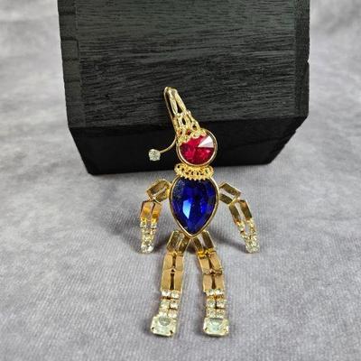 Reticulated clown brooch