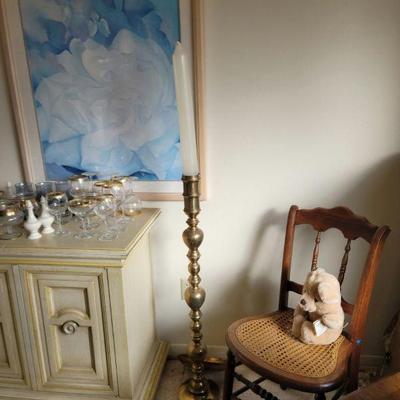 A quaint space - Brass floor candle holders, sideboard and bar ware