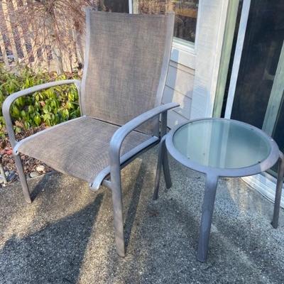 Side patio table included with patio set
