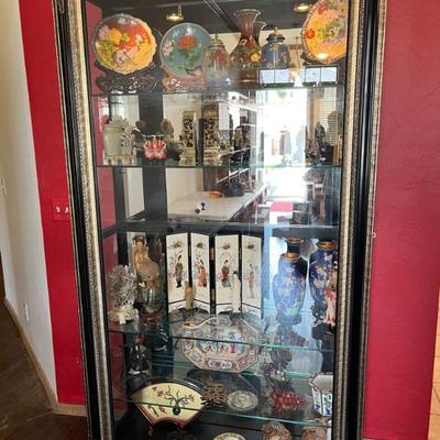 This Curio cabinet is full of Antique Cloisonn Enamel over Copper, hand painted Japanese plates
