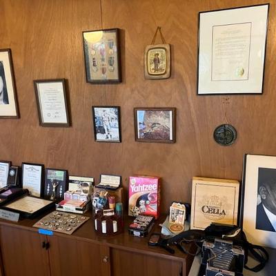 framed military medals, photos and more.