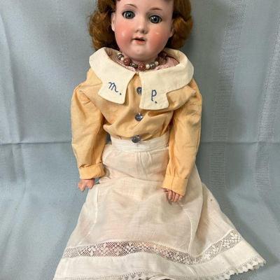 Armand marseille bisque leather doll