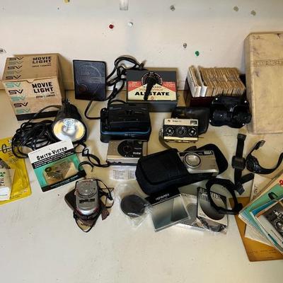 https://ctbids.com/estate-sale/34519/item/3870080/Vintage-Film-Cameras-And-View-Master